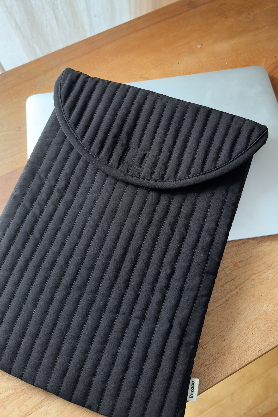 La pochette à ordinateur 13-14'' - Noir résistant à l'eau